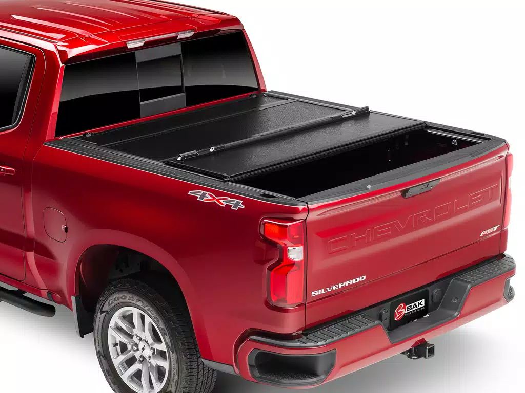 BAK® • 772130 • BAKFlip F1 • Hard Folding Tonneau Cover • Chevrolet Silverado / GMC Sierra 1500 5'8" 19-23 without Carbon Pro Bed