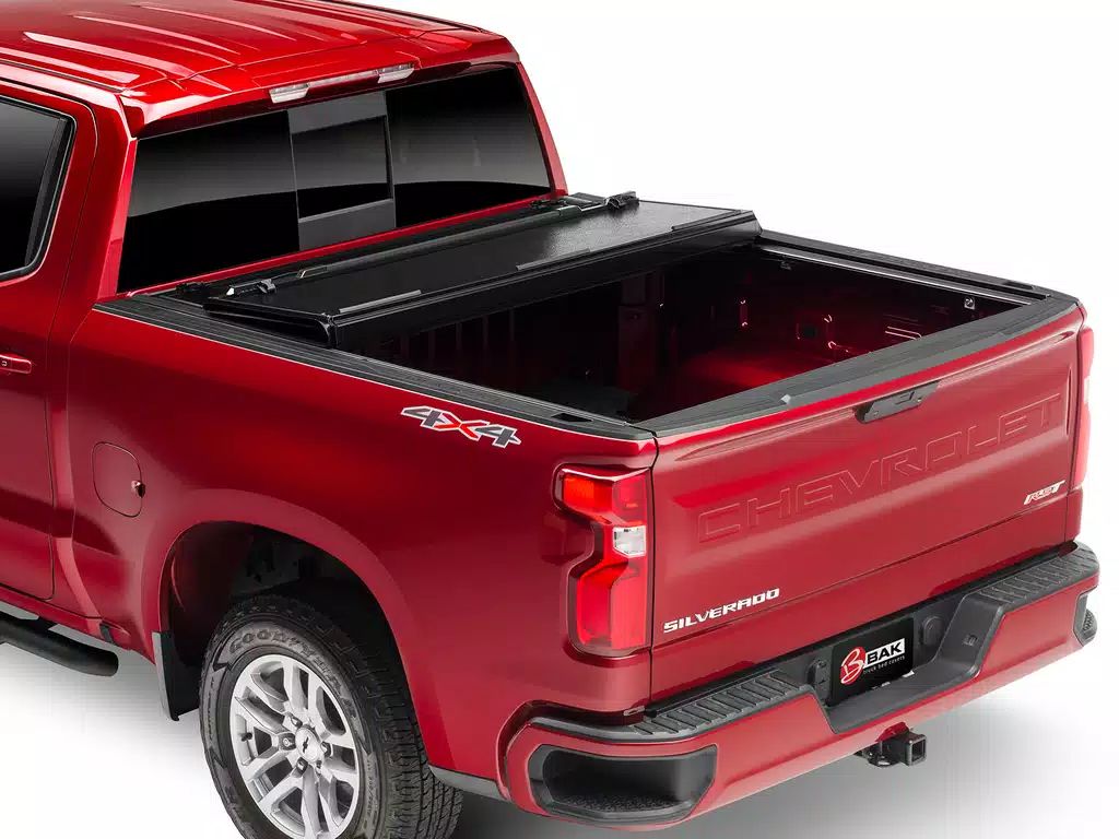 BAK® • 772130 • BAKFlip F1 • Hard Folding Tonneau Cover • Chevrolet Silverado / GMC Sierra 1500 5'8" 19-23 without Carbon Pro Bed