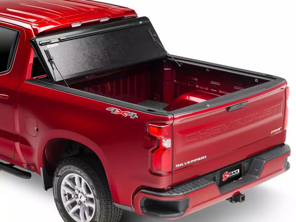 BAK® • 772130 • BAKFlip F1 • Hard Folding Tonneau Cover • Chevrolet Silverado / GMC Sierra 1500 5'8" 19-23 without Carbon Pro Bed